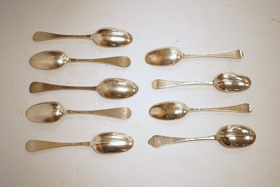 An 18th century Irish? provincial silver Hanoverian pattern tablespoon, maker's mark stamped twice 'I.T with crown above and mullet below' and 'Sterling', 20.9cm, together with eight assorted 18th century silver rat tail